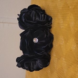 Handcrafted satin flower headband.